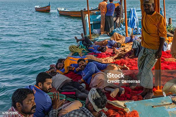 Fishing Crew Take A Break Kannur Kerala India Stock Photo - Download Image Now - Crew, Fishing, Fishing Industry