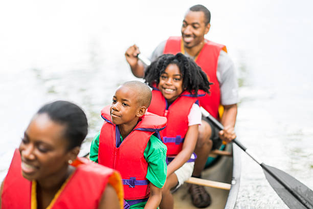 istock Family Canoe Trip 471576143