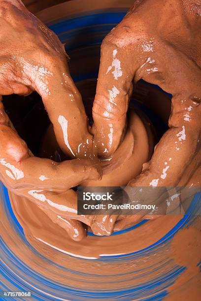 Closeup Of Hands Of Potter Working On Pottery Wheel Stock Photo - Download Image Now