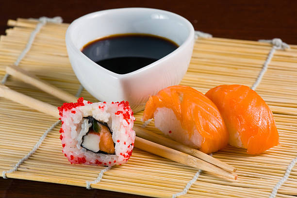 istock sushi in row on bamboo mat 471578145