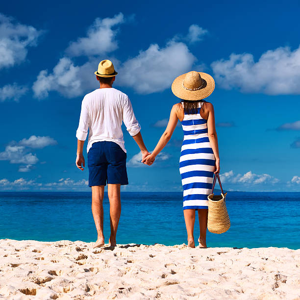 istock Couple on a beach at Seychelles 471578170