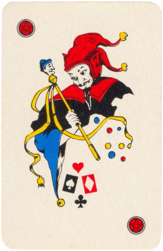 Paris, France - June 11, 2013: Old playing card joker, devil style.