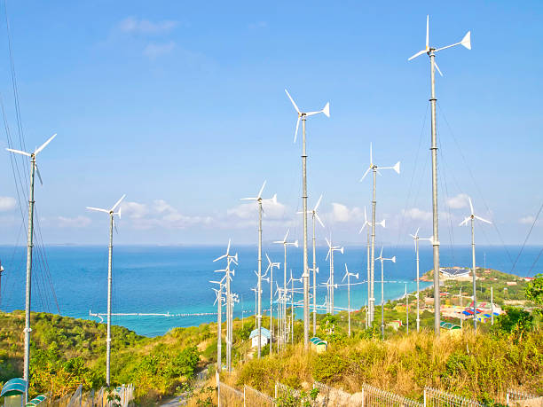istock Power Generating Wind turbine on hill 471579221