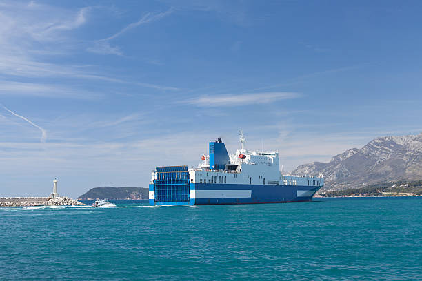 istock Car carrier leaves the Port 471581618