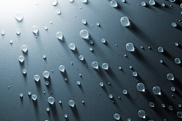 istock Water drops on the embossed surface of tension ceiling 471581753