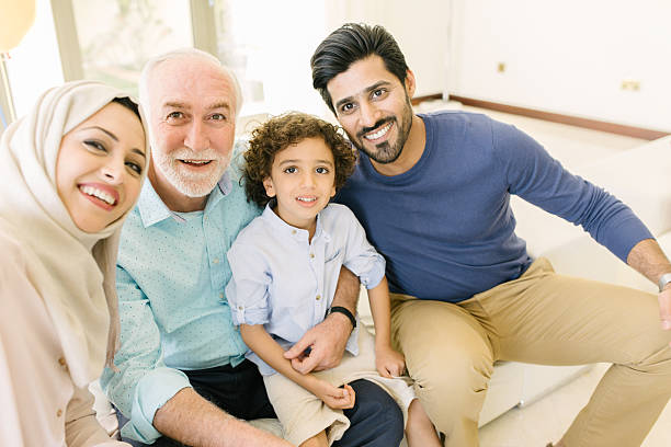 Three Genration Arabic family taking a selfie stock photo