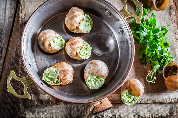 istock Homemade snails with herbs and garlic butter 471583164