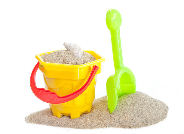 istock sand bucket and spade toy 471586249