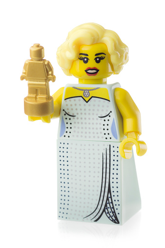 Virginia, United States - June 20, 2013: Lego Hollywood Starlet mini figure from Series 9. Lego figures are a small plastic toy produced by the Danish toy manufacturer the Lego Group. Mini figures were first produced in 1978