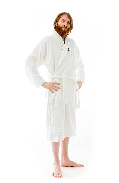 model isolated on plain background pround confident hands on hip Model in studio isolated on white background bathrobe stock pictures, royalty-free photos & images