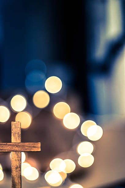 istock Wooden Cross and Defocused Lights 471587414