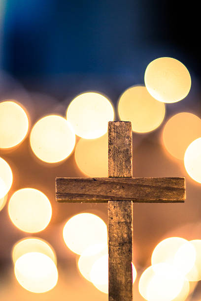istock Wooden Cross and Defocused Lights 471587432