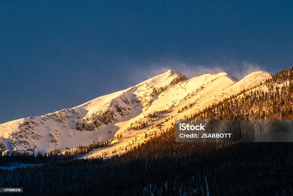 Rocky Mountain Sunrise Sun rising on the slopes of Peak One near Frisco, Co. Colorado Stock Photo