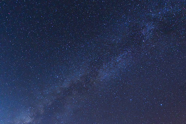 istock Milky way galaxy with stars and space 471588498