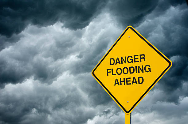 istock Flooding Ahead Road Sign 471589119