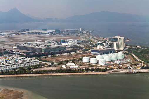 Hong Kong, China - April 16, 2011: Aerial view of International airport of Hong Kong. It is the main airport in Hong Kong and known as Chek Lap Kok Airport being built on the island of Chek Lap Kok.