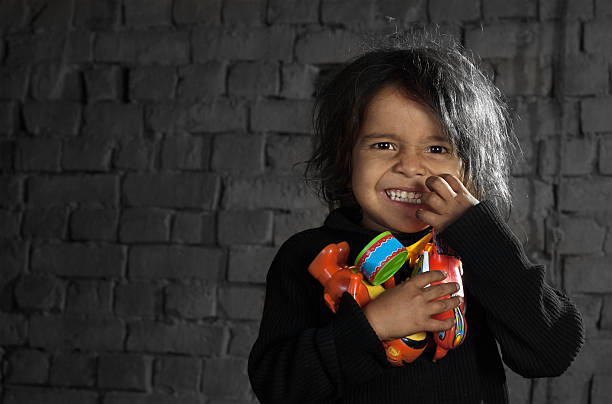 istock Happy Child Holding Toys Landscape 471591213