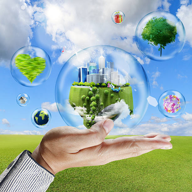 istock Hand holds bubbles with business collection inside 471592323
