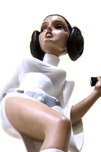Vancouver, Canada - May 20, 2013: A statue of Princess Leia, from the Star Wars film franchise, against a white background.