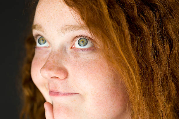 istock model isolated on black red hair 471592786