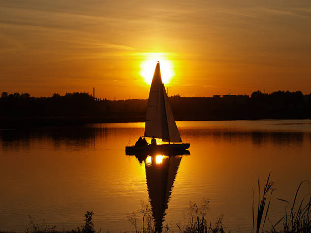 istock sailboat on the lake, sunset landscape 471592880