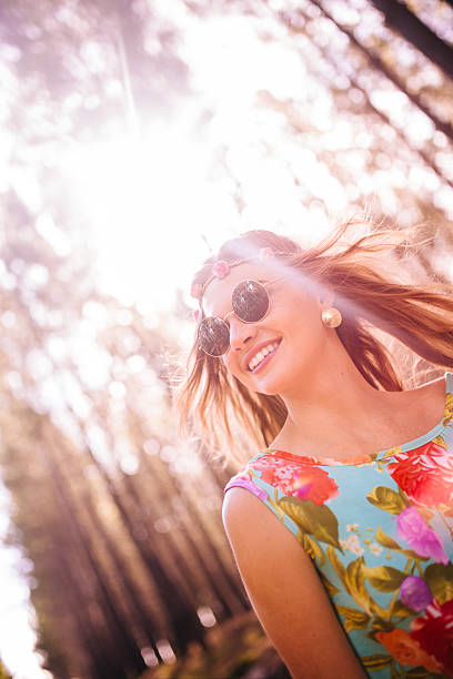 istock Boho girl in forest with hair blowing in breeze 471593688