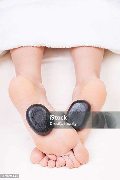 Hot Stone Reflexology Feet Massage Stock Photo - Download Image Now - Adult, Alternative Therapy, Basalt