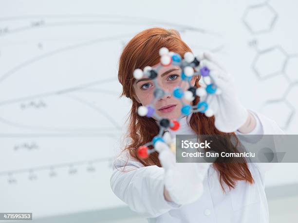 Student Dmt Molecule Analysis Stock Photo - Download Image Now - Fashion, Molecular Structure, Physics