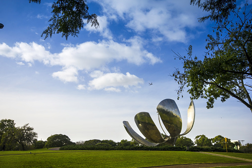 Buenos Aires, Argentina - June 14, 2013: Photo of The Floralis Generica, a famous sculpture at Buenos Aires, Argentina. It is located  at United Nations Park.