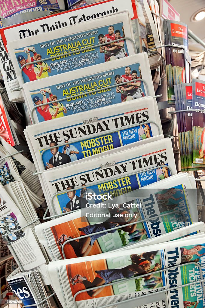 Newspapers Amsterdam, the Netherlands - June 9, 2013: English newspapers for sale in a newsstand on the street of a Dutch shop in Amsterdam. The Sunday Times, The Observer and The Daily Telegraph can be seen. Serena Williams - Tennis Player Stock Photo