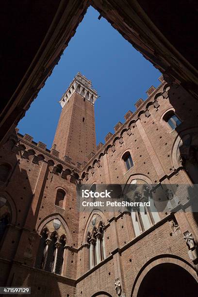 Mangia Tower In The Piazza Del Campo Siena Diagonal Stock Photo - Download Image Now