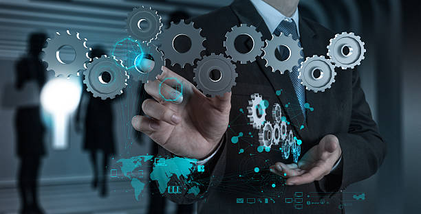 istock businessman hand draws gear to success 471597799