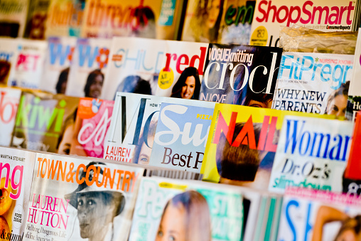 Los Angeles, USA - May 15, 2013: Colorful American Magazines displayed for sale on newsstand in Los Angeles.