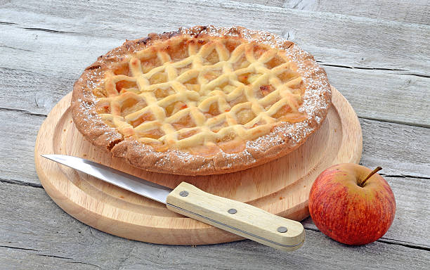 Aplle pie on cutting board stock photo