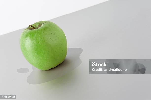 Apple Mac Pro Grey Case Computer With Real Green Fruit Stock Photo - Download Image Now