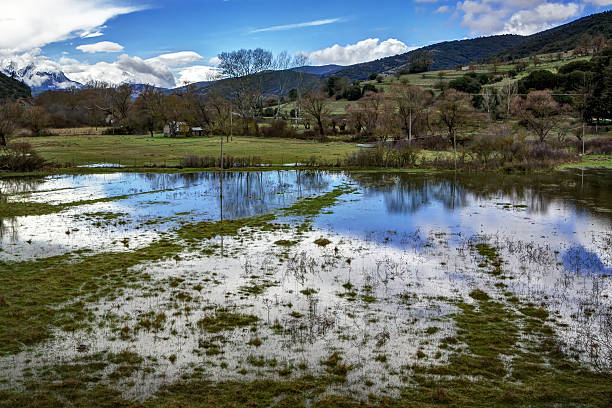 istock Rural scenery with reflections on a pond, in Kalavryta Greece 471599956