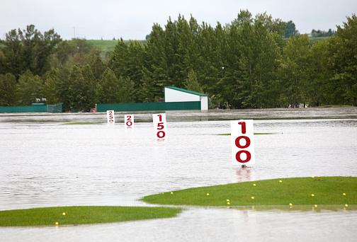 Calgary, Canada - June 21, 2013: A flooded golf course in Calgary, Alberta during the massive flood in 2013.