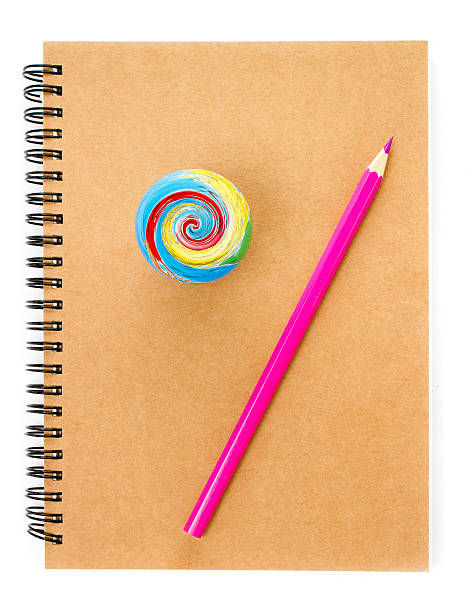 Notebook and pencil over white  background. Back to school