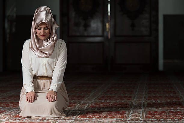 istock Young Muslim Woman Praying 471603788