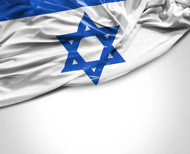 Israeli waving flag on white background
