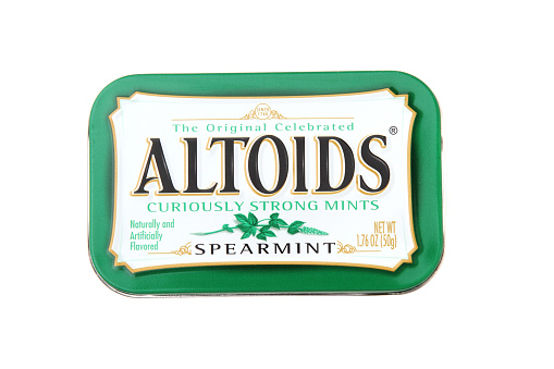 West Palm Beach, USA - May 28, 2013: A metal tin of Altoids Spearmint Mints. Altoids are distributed by Callard and Bowser.