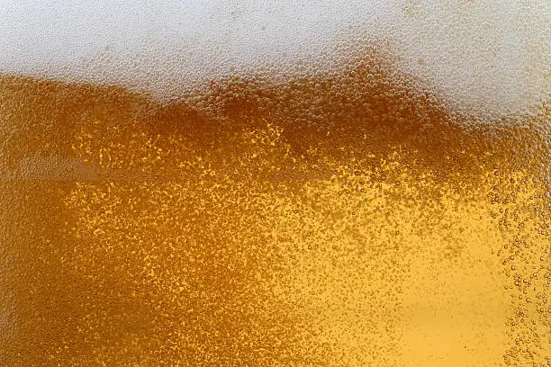 Bubbles and foam in a beer