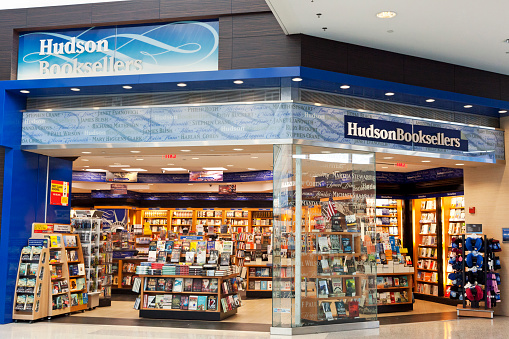 New York City, USA - June 22, 2013: Book store of Hudson Booksellers at the Newark Airport New York. Since its inception, Hudson has placed an industry-leading focus on selling books and other reading materials to airport travelers. Today, Hudson Booksellers operates 66 full-service bookstores in airports throughout North America.