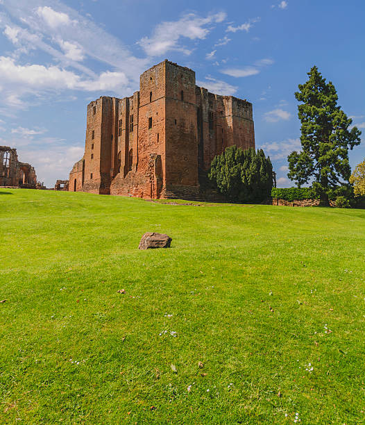 kenilworth castle Kenilworth, UK - June 7, 2013: Kenilworth castle is an Elizabethan castle in the English Midlands in the county of Warwickshire. It is now in ruins, but is still a popular tourist attraction due to its impressive structure and size. The picture is taken on a warm sunny day in summer. kenilworth castle stock pictures, royalty-free photos & images
