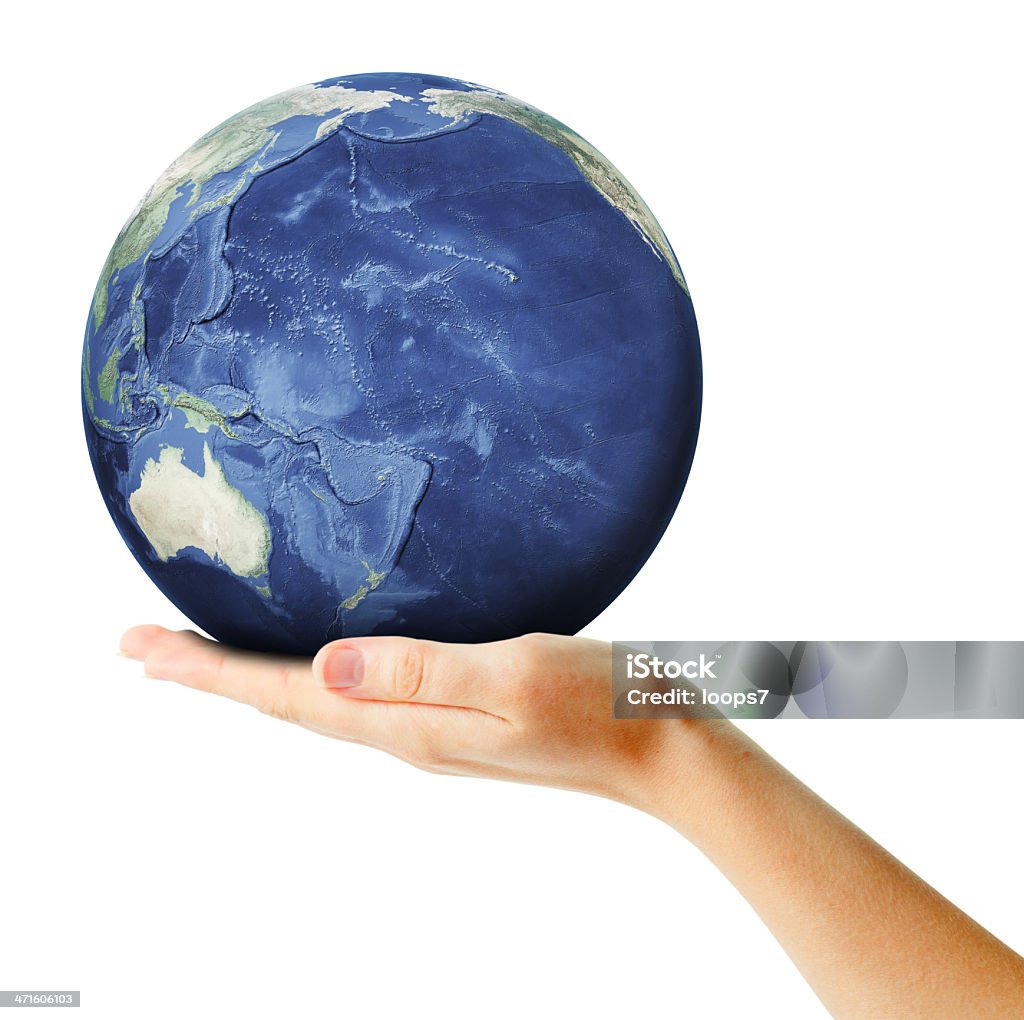 Earth in Hand A woman hand holding the Earth showing Oceania, isolated on white. Adult Stock Photo
