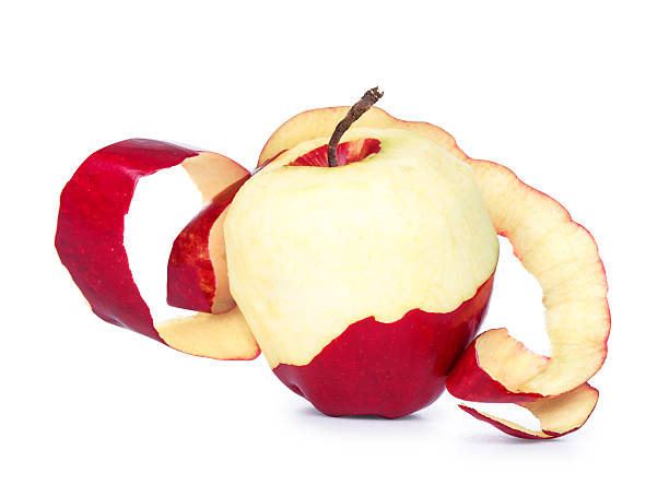 istock red apple with peeled skin isolated on white background 471606776