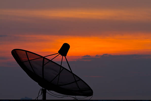 istock Sunrise close to the satellite dish 471608529