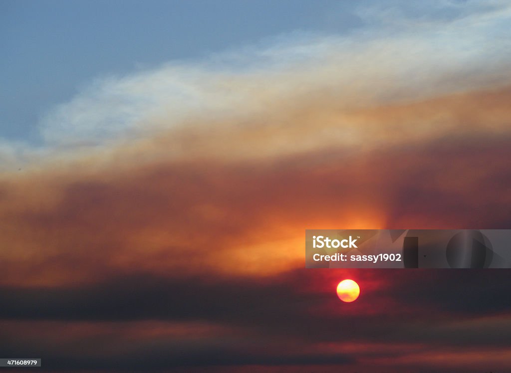 Sunset Arizona Clouds Smoke Sunset in Sedona Arizona.  Photo was taken at sunset while smoke from the Prescott forest fires could be seen in the sky. Agreement Stock Photo