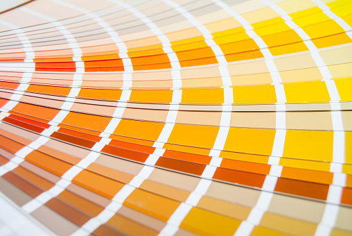 Orange paint samples spread in a fan shape
