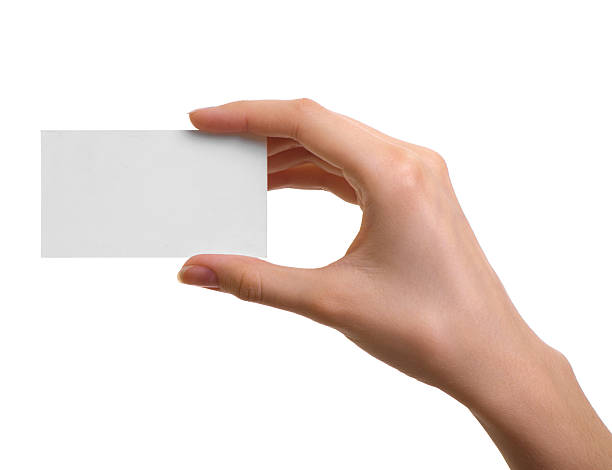 istock Paper card in woman hand isolated on white background 471609453